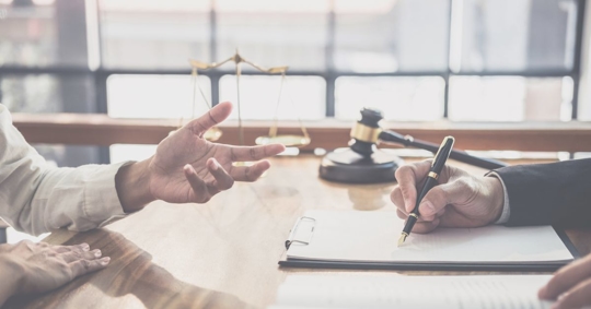 attorney speaking with client