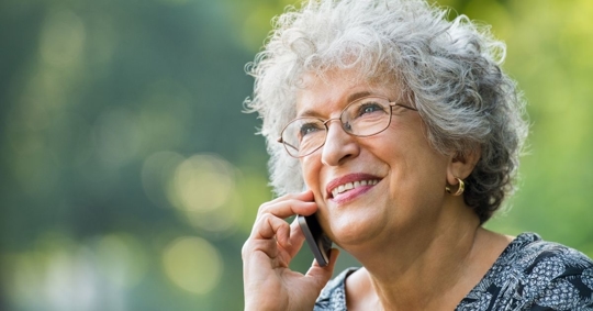 old woman talking on the phone