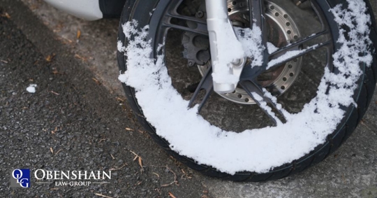 motorcycle wheel with snow