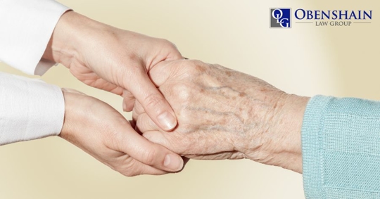 holding an elder loved one