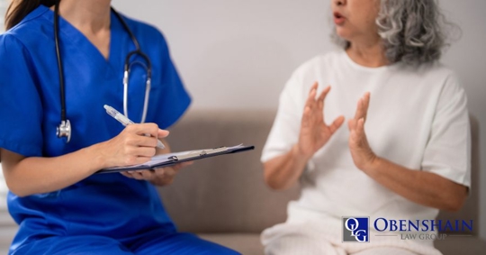 elderly woman talking to nurse