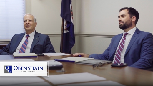 Two male attorneys sitting at a conference table